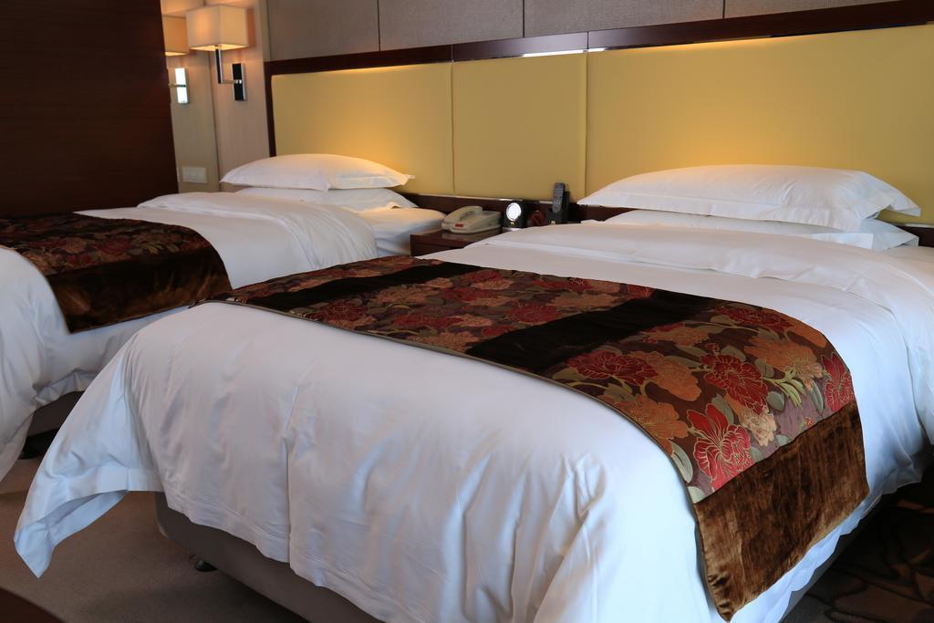 Guangzhou Changfeng Gloria Plaza Hotel Kamer foto